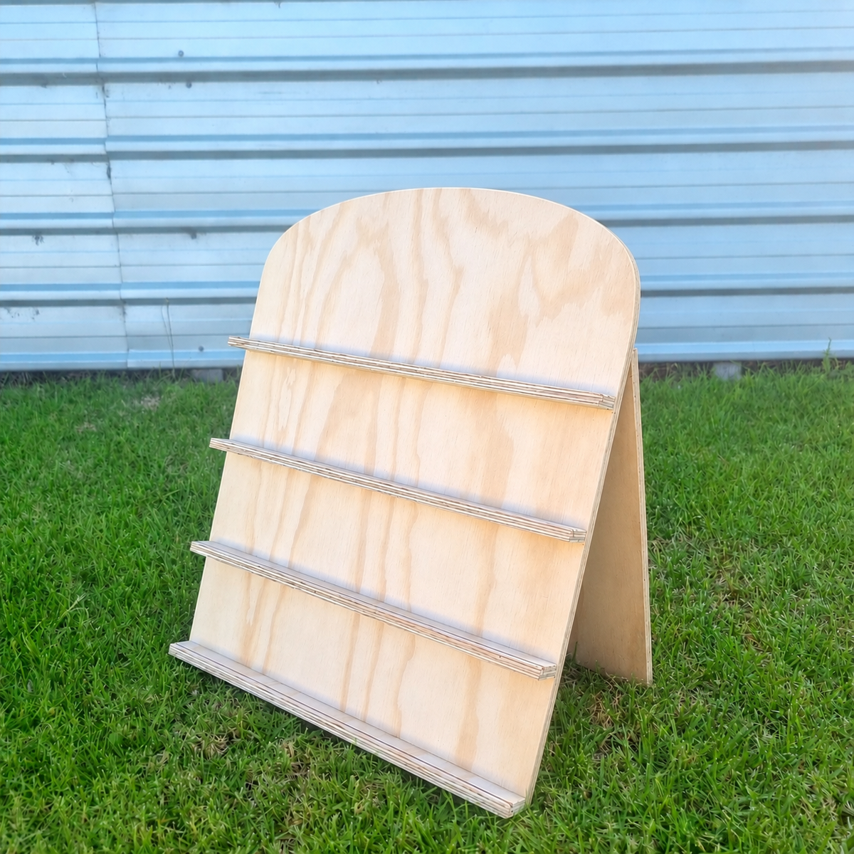 Standing board card product display - curved top