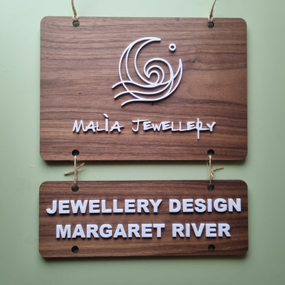 Hanging tiered signs