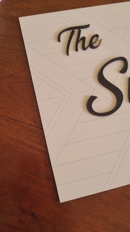 Family name sign - geometric design