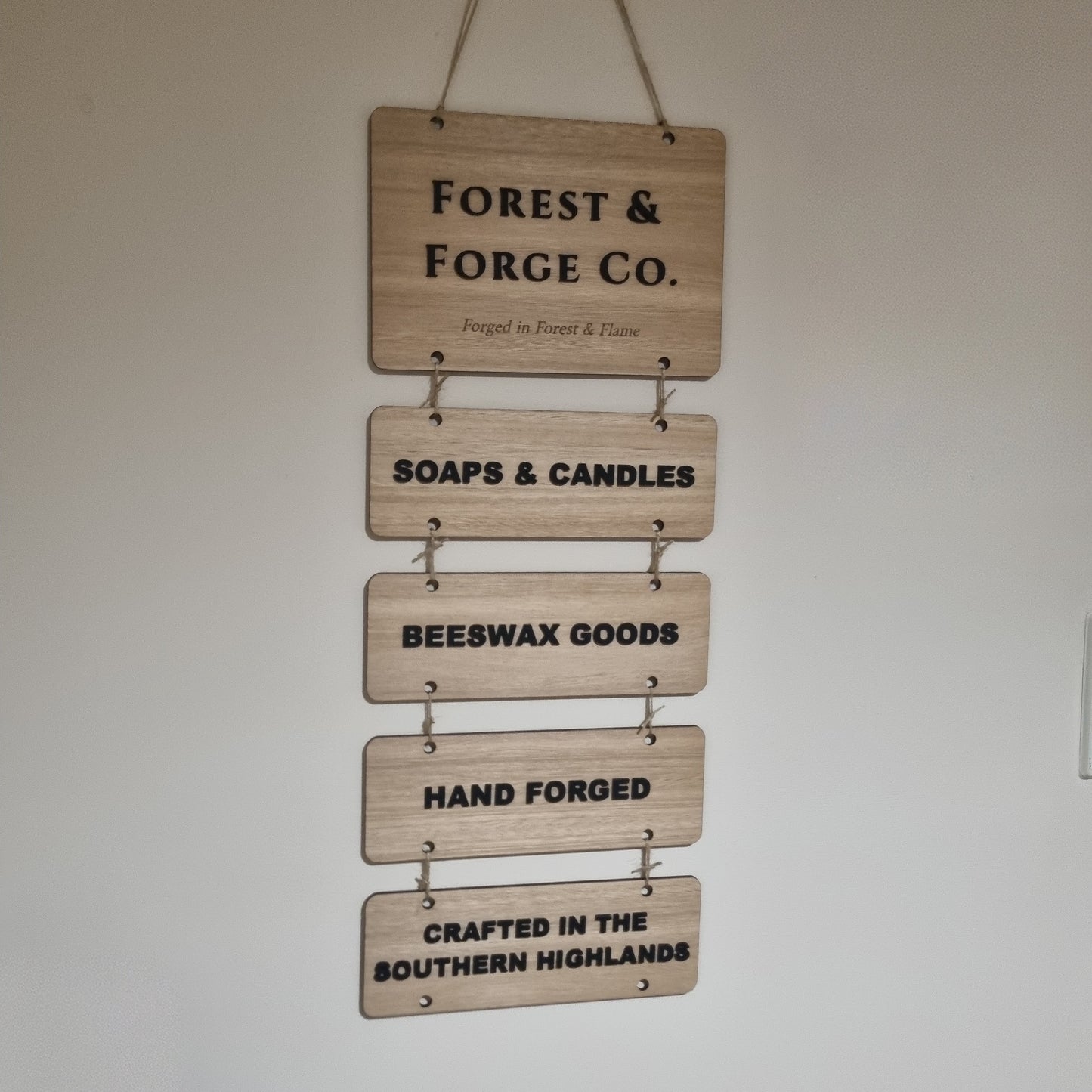 Hanging tiered signs
