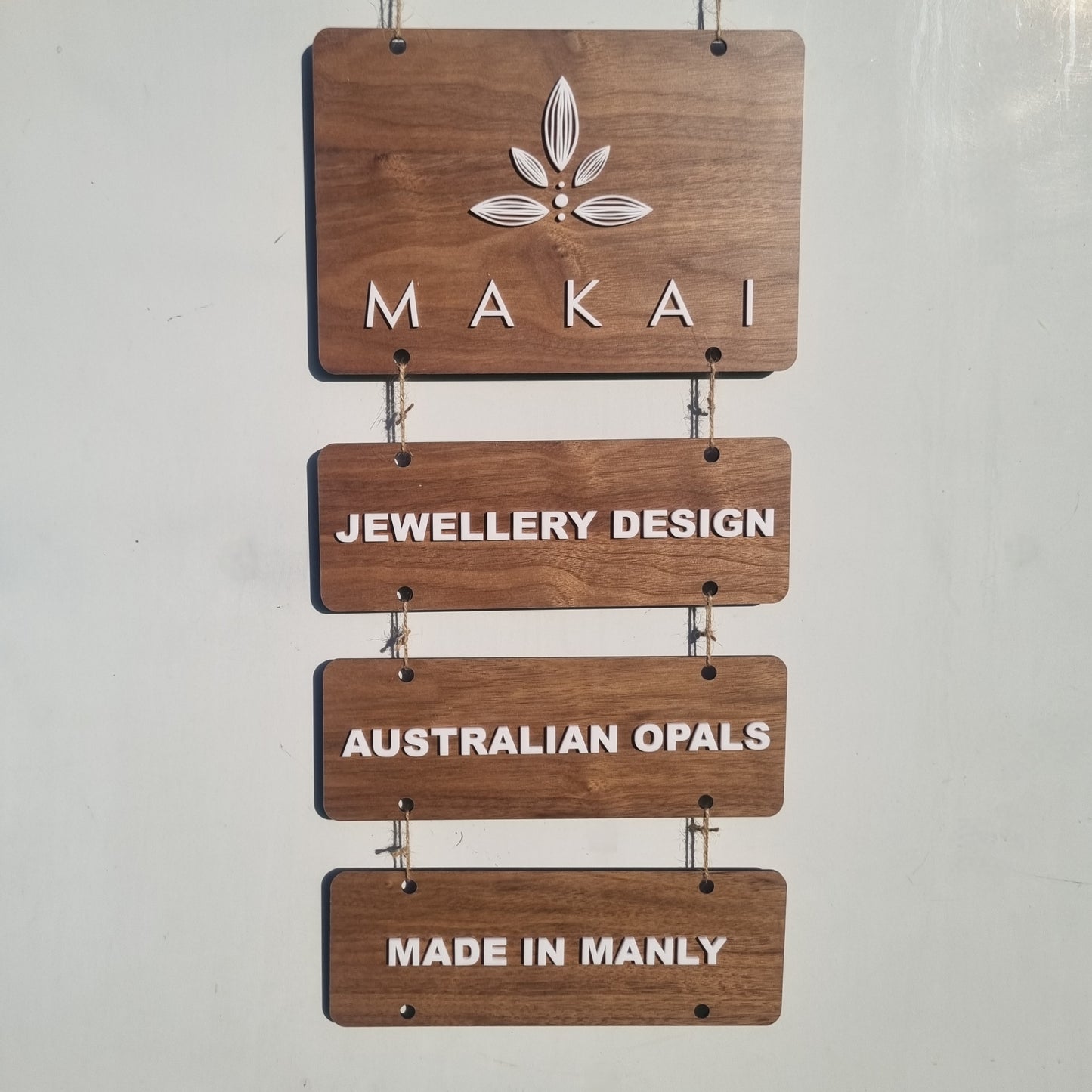 Hanging tiered signs