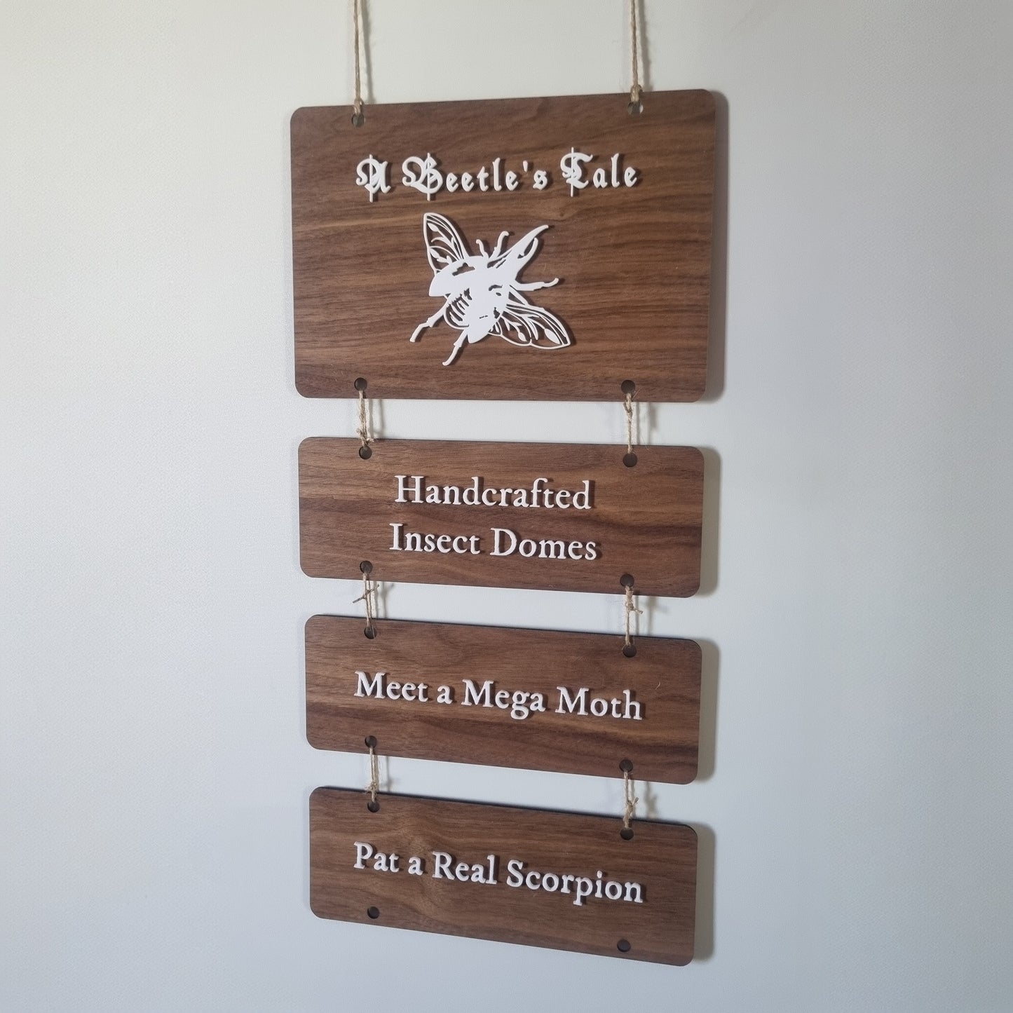 Hanging tiered signs